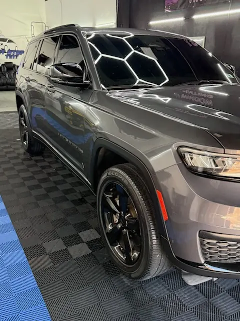 Tinted Jeep Grand Cherokee L in the shop - Shortstop Tint in Philadelphia, PA